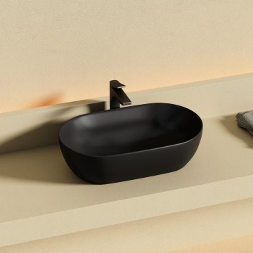 Раковина CERAMICANOVA Twist накладная овальной формы 500x300x140 черный матовый CN12001MB
