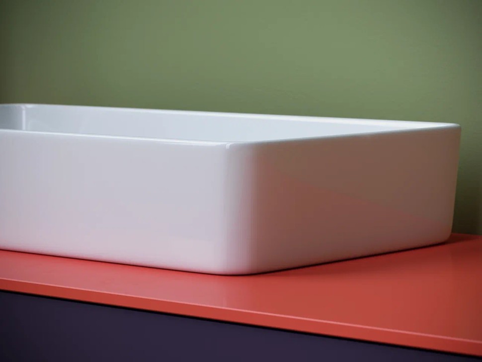 Раковина накладная со смещенным сливом, с возможностью установки на столешницу под стиральную машину, 620x340x110, цвет белый