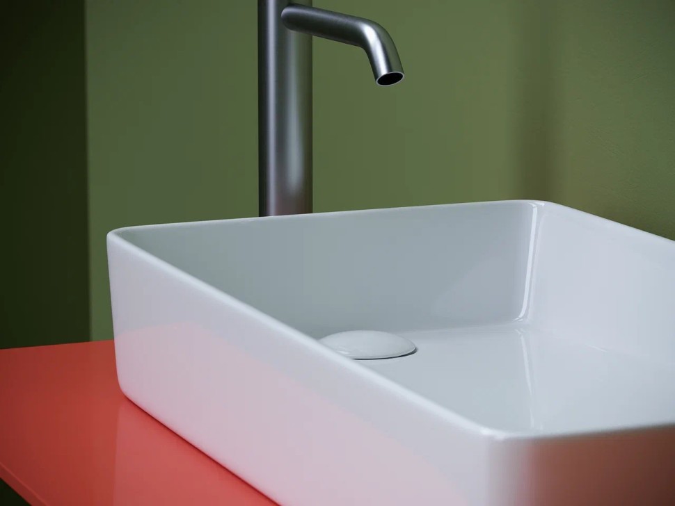 Раковина накладная со смещенным сливом, с возможностью установки на столешницу под стиральную машину, 620x340x110, цвет белый