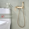 Смеситель Raglo настенный с гигиеническим душем золотой сатин